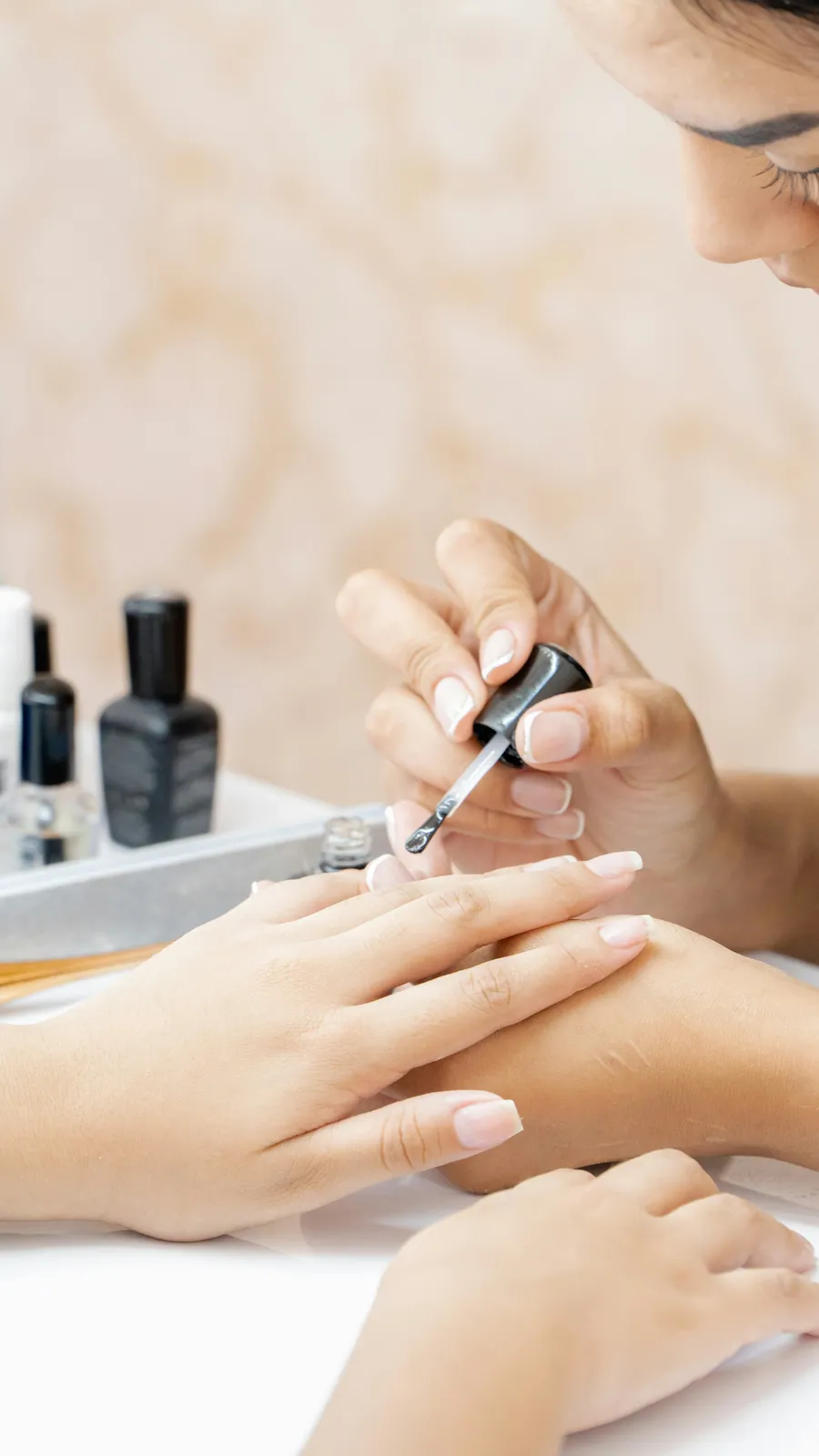 A client receiving a facial treatment at a beauty salon